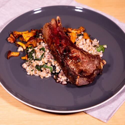 Venison with a black berry sauce and spelt