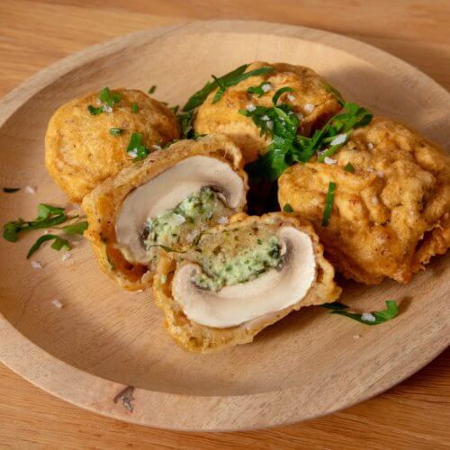 Stuffed and battered button mushrooms