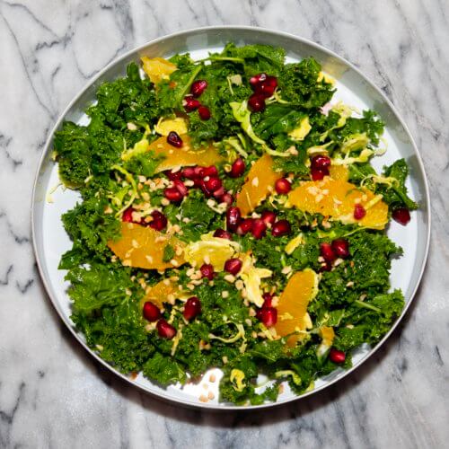 Bejewelled raw kale and orange salad